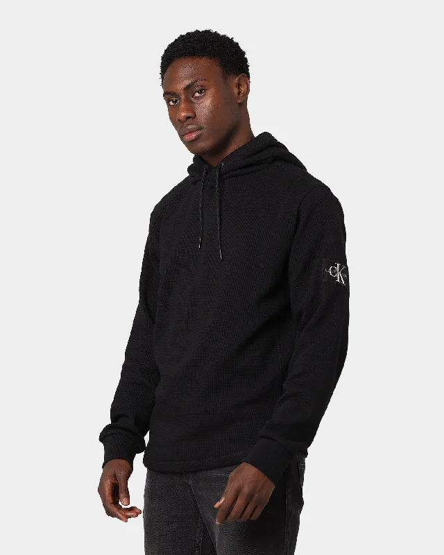 Calvin Klein Mini Waffle Knit Badge Hoodie Black Hoodie with Reflective Safety Nightwear Calvin Klein Mini Waffle Knit Badge Hoodie Black Hoodie with Reflective Safety Nightwear